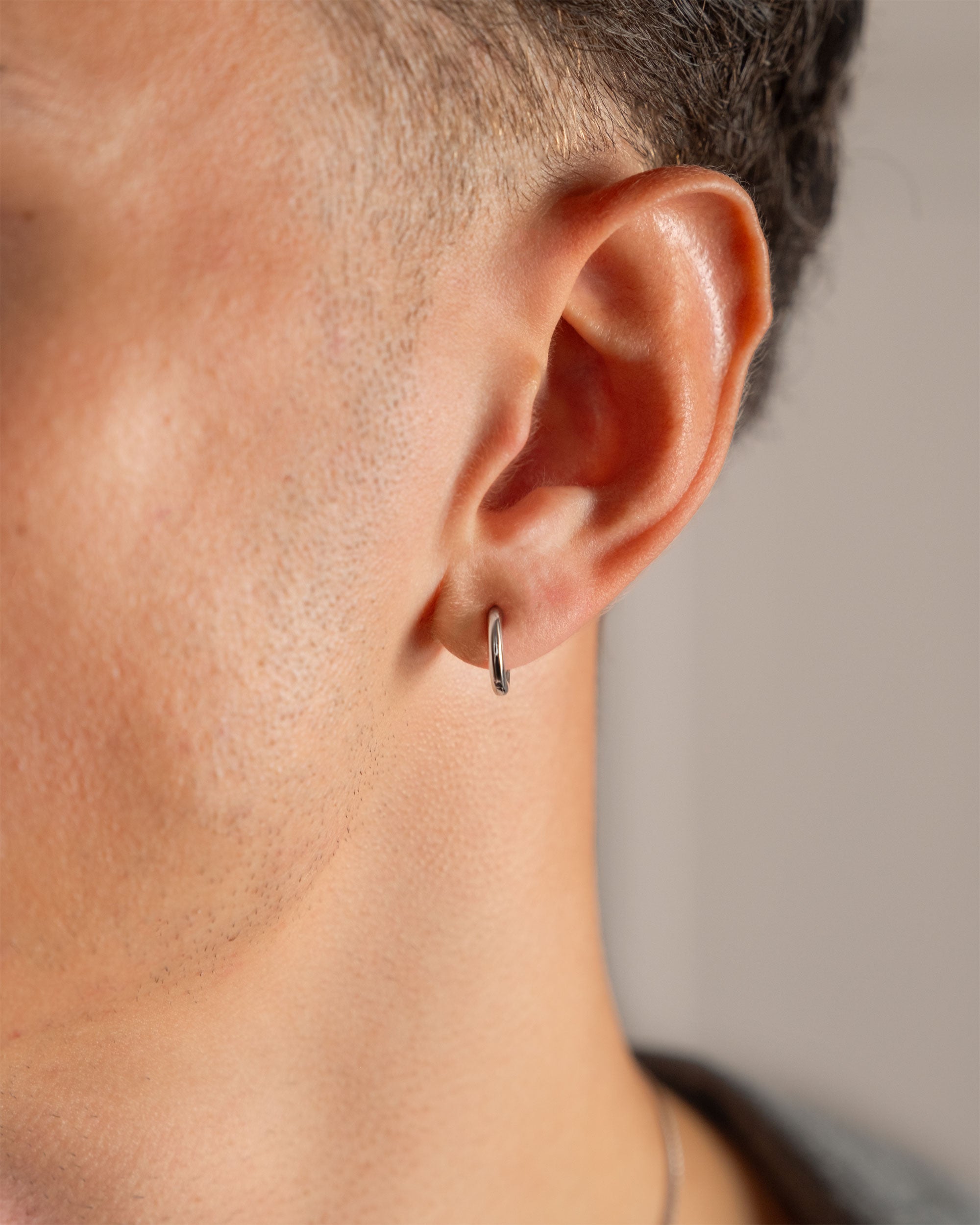 sterling silver medium 12mm hoop earring worn on ear – close-up – Fravour
#material_925 Sterling Silver